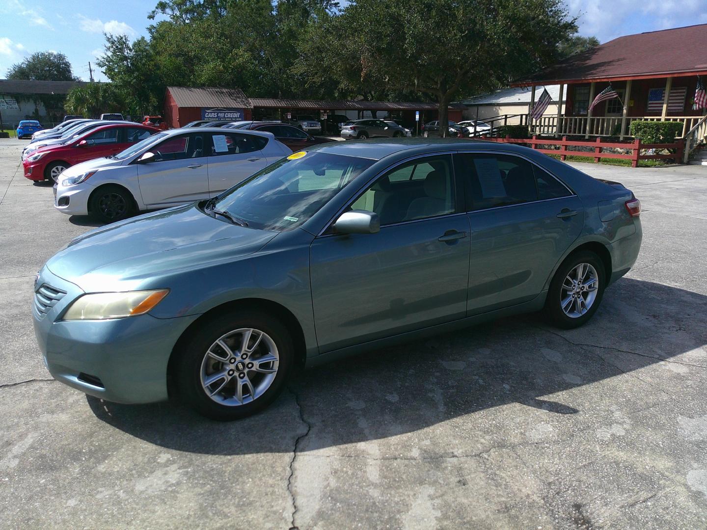 2009 GRN TOYOTA CAMRY CE; SE; LE; XL (4T4BE46K59R) , located at 1200 Cassat Avenue, Jacksonville, FL, 32205, (904) 695-1885, 30.302404, -81.731033 - Photo#1